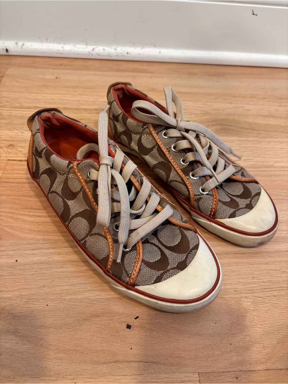 Coach Barrett sneakers featuring a signature monogram canvas size 6